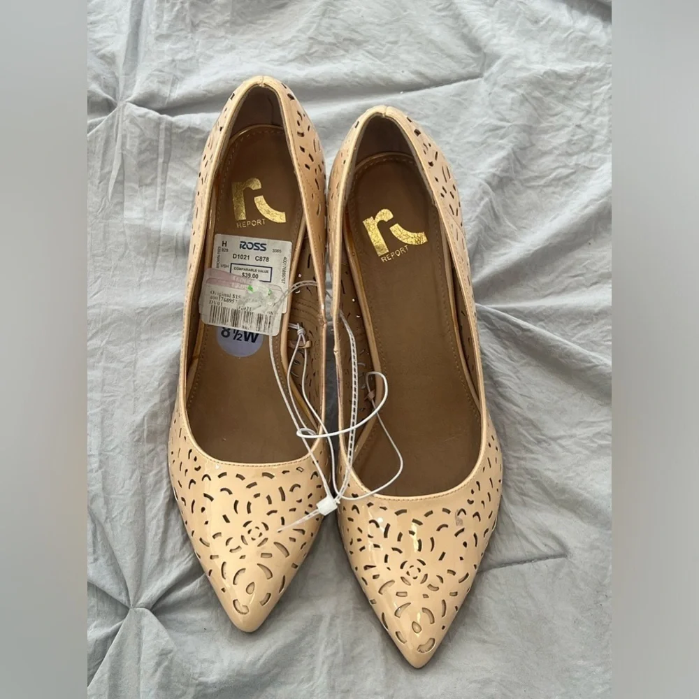 Report Fenestrated pointy toe heels pumps
